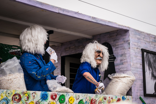 Basel Switzerland 10 March 2025 View of whimsical figures in blue attire and elaborate white wigs captured during Fasnacht celebrations exuding an air of festive creativity. Basel Switzerland 10 March 2025 View of whimsical figures in blue attire and elaborate white wigs captured during Fasnacht celebrations exuding an air of festive creativity.