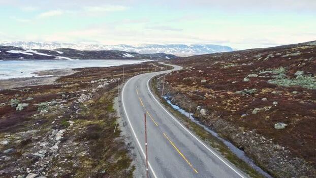 Aerial view of a winding road in Hardangervidda Norway. Aerial view of a winding road in Hardangervidda Norway.