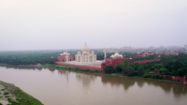 Aerial view of Taj Mahal along the Yamuna River in Agra India. Aerial view of Taj Mahal along the Yamuna River in Agra India.