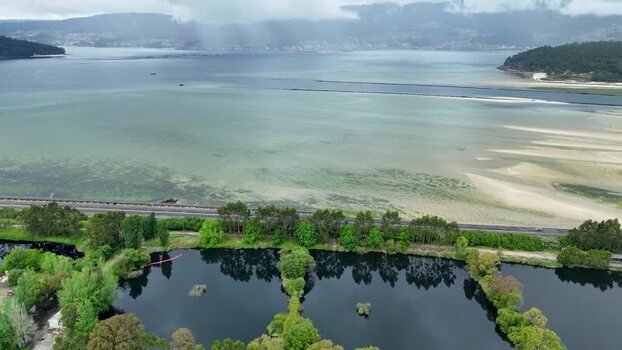 Aerial view of Biofabrica de Ence and the estuary in Spain. Aerial view of Biofabrica de Ence and the estuary in Spain.