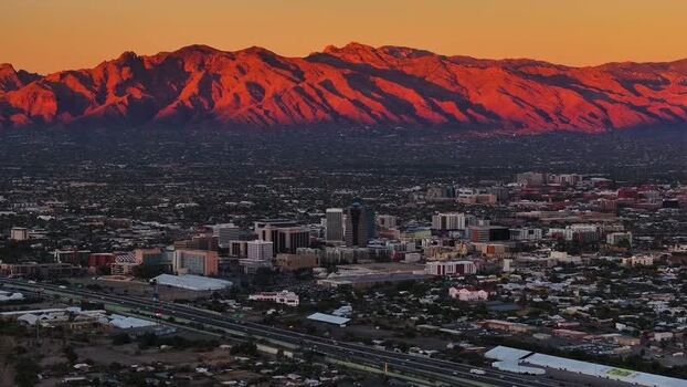 Aerial view of Tucson skyline and glowing mountains USA. Aerial view of Tucson skyline and glowing mountains USA.