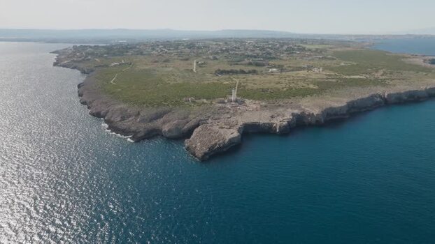 Aerial view of Plemmirio coastline and lighthouse Italy.