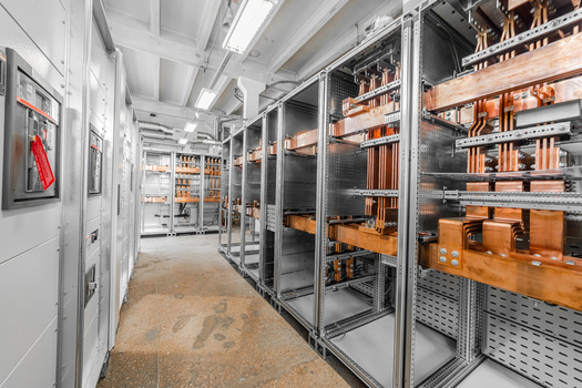 View of industrial electrical switchgear cabinets with copper busbars and technical infrastructure in Latvia. View of industrial electrical switchgear cabinets with copper busbars and technical infrastructure in Latvia.