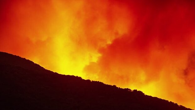 View of volcanic eruption with glowing lava in Spain.
