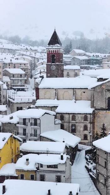 Aerial view of Rivisondoli in the snow Italy.
