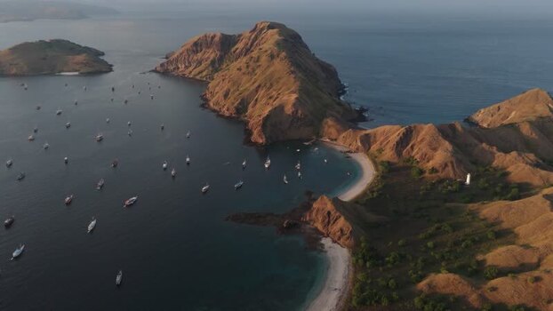 Aerial view of Padar Island and boats in the bay Indonesia.