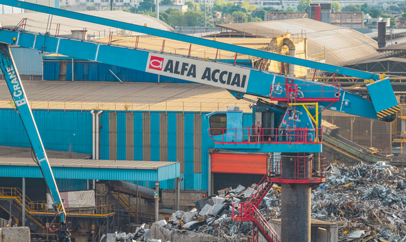 Brescia Italy 13 September 2026 Aerial view of the Alfa Acciai crane and scrap metal storage yard used for recycled steel feedstock at the company steel plant. Brescia Italy 13 September 2026 Aerial view of the Alfa Acciai crane and scrap metal storage yard used for recycled steel feedstock at the company steel plant.