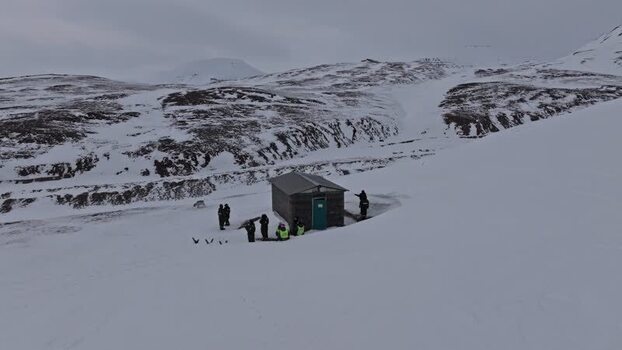 Aerial view of Pyramiden cabin in snow Svalbard and Jan Mayen.