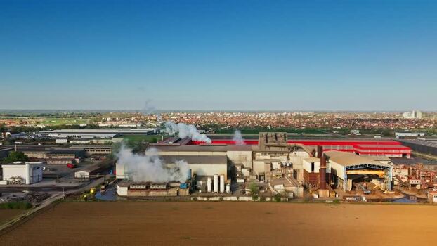 Aerial view of industrial plant with smoke Serbia.