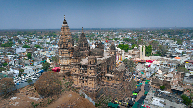 Orchha India 08 May 2026 Aerial view of the Chaturbhuj Temple with its massive stone spires overlooking the historic town and surrounding landscape under a clear blue sky. Orchha India 08 May 2026 Aerial view of the Chaturbhuj Temple with its massive stone spires overlooking the historic town and surrounding landscape under a clear blue sky.