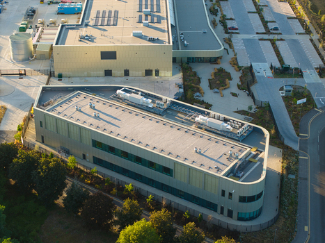 Aerial view of the Moderna Innovation and Technology Centre featuring a modern industrial building with a flat roof and grounds in Harwell Oxford England United Kingdom.