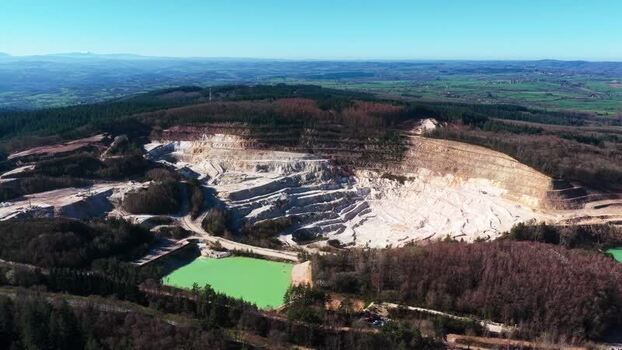 Aerial view of quarry and green pond France.