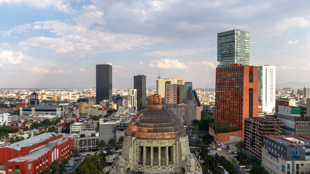 Mexico City Mexico 15 July 2026 Aerial view of the Monumento a la Revolucion dome surrounded by the dense urban skyline of Mexico City with modern skyscrapers and historic buildings. Mexico City Mexico 15 July 2026 Aerial view of the Monumento a la Revolucion dome surrounded by the dense urban skyline of Mexico City with modern skyscrapers and historic buildings.