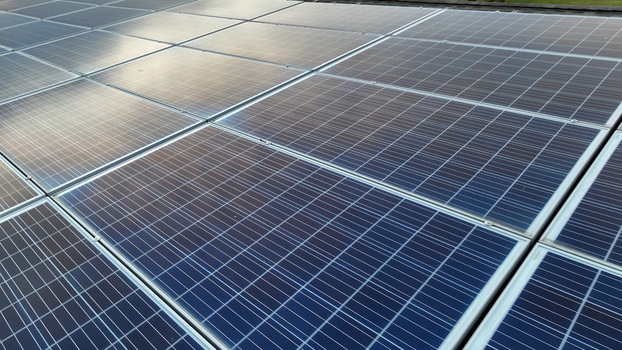 Aerial view of solar panels installed on a residential roof in Akron Pennsylvania United States.