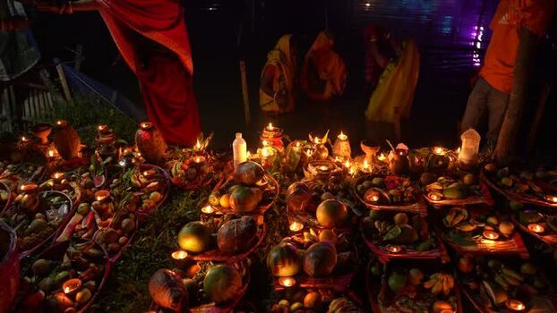 View of religious offerings and lit lamps at night Bangladesh. View of religious offerings and lit lamps at night Bangladesh.