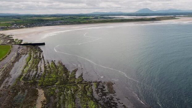 Aerial view of Enniscrone Pier and coastline in Ireland. Aerial view of Enniscrone Pier and coastline in Ireland.