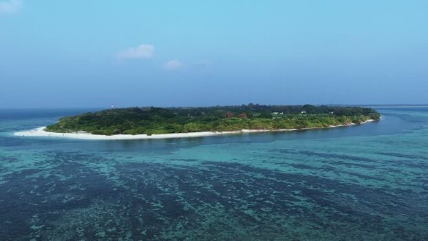 Aerial view of Vaikaradhoo island in the Maldives. Aerial view of Vaikaradhoo island in the Maldives.