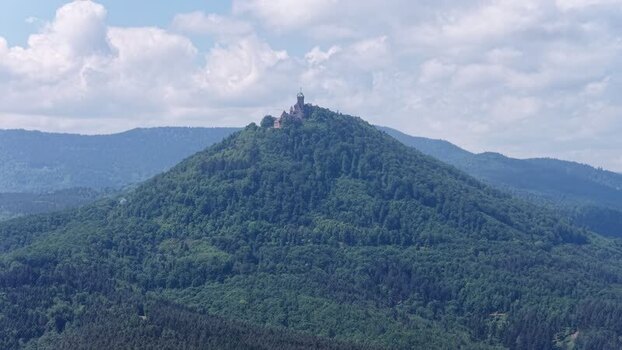 Aerial view of Haut Koenigsbourg Castle on a forested hill France.