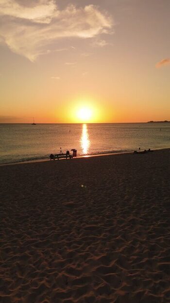 Aerial view of Grand Cayman beach at sunset Cayman Islands. Aerial view of Grand Cayman beach at sunset Cayman Islands.
