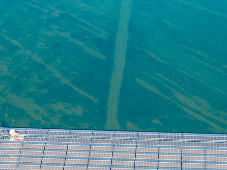 Aerial view of the floating solar farm at Cottbuser Ostsee a former open pit mine showing repair works on the solar panels after storm damage. Cottbus Brandenburg Germany. Aerial view of the floating solar farm at Cottbuser Ostsee a former open pit mine showing repair works on the solar panels after storm damage. Cottbus Brandenburg Germany.