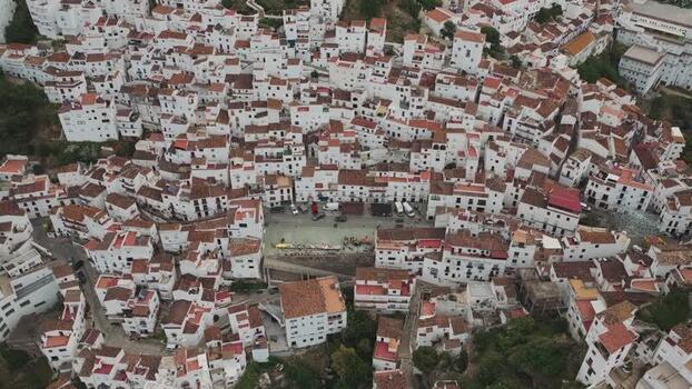 Aerial view of the white houses and rooftops in Casares Spain. Aerial view of the white houses and rooftops in Casares Spain.
