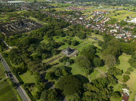 Aerial view of Bubrah Temple surrounded by lush green lawns and dense trees in Kecamatan Prambanan Jawa Tengah Indonesia. Aerial view of Bubrah Temple surrounded by lush green lawns and dense trees in Kecamatan Prambanan Jawa Tengah Indonesia.