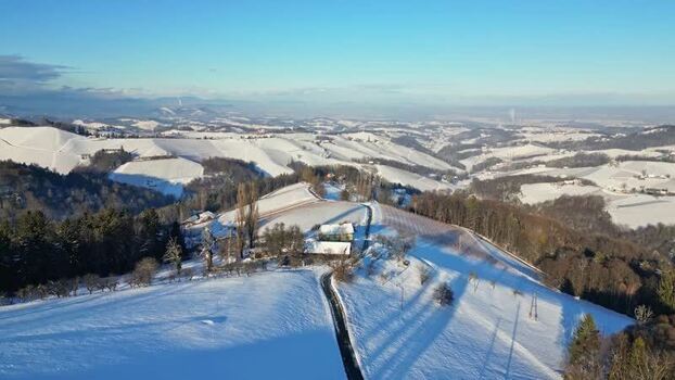Aerial view of Lubekogel hill and snow covered vineyards Austria. Aerial view of Lubekogel hill and snow covered vineyards Austria.