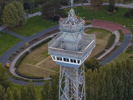 Aerial view of the iconic Berlin Radio Tower rising above the Sommergarten event grounds at Messe Berlin featuring its steel lattice structure and observation deck Berlin Berlin Germany. Aerial view of the iconic Berlin Radio Tower rising above the Sommergarten event grounds at Messe Berlin featuring its steel lattice structure and observation deck Berlin Berlin Germany.