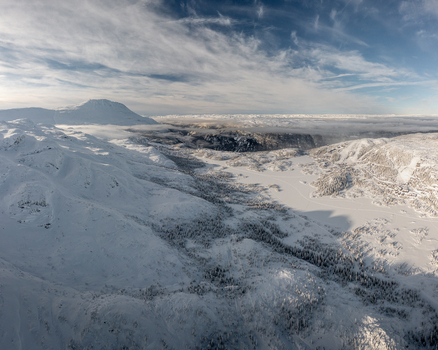 Aerial view of Gaustablikk Fjellresort nestled in the snow covered mountains of Rjukan Telemark Norway. Aerial view of Gaustablikk Fjellresort nestled in the snow covered mountains of Rjukan Telemark Norway.