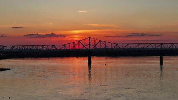 Aerial view of a bridge over the Ohio River at sunset United States. Aerial view of a bridge over the Ohio River at sunset United States.