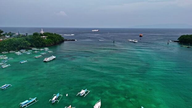Aerial view of boats in a bay in Bali Indonesia.