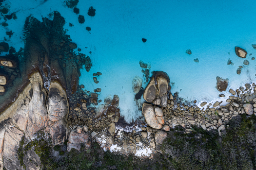 Aerial view of the turquoise waters and rocky coastline of Frenchman Bay in Albany Western Australia Australia. Aerial view of the turquoise waters and rocky coastline of Frenchman Bay in Albany Western Australia Australia.