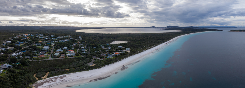 Aerial view of Frenchman Bay with its turquoise waters white sandy beach and surrounding coastal vegetation in Albany Western Australia Australia. Aerial view of Frenchman Bay with its turquoise waters white sandy beach and surrounding coastal vegetation in Albany Western Australia Australia.