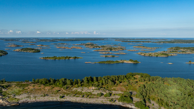 Aerial view of the Oro Fortress Island archipelago with small islands dense pine forests and rocky shorelines in the calm Baltic Sea Oro Varsinais Suomi Finland. Aerial view of the Oro Fortress Island archipelago with small islands dense pine forests and rocky shorelines in the calm Baltic Sea Oro Varsinais Suomi Finland.