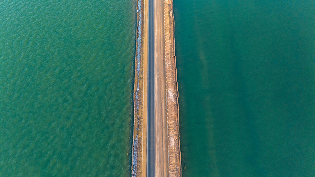 Aerial view of the Road to Heaven stretching across the salt flats and water in Bhuj Gujarat India. Aerial view of the Road to Heaven stretching across the salt flats and water in Bhuj Gujarat India.