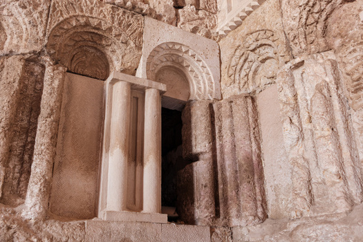 View of the intricate stone carvings and arched niches of the historic Umayyad Palace in Amman Amman Governorate Jordan.