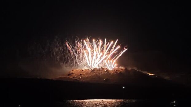 View of Ifestia volcano eruption fireworks in Fira Greece. View of Ifestia volcano eruption fireworks in Fira Greece.