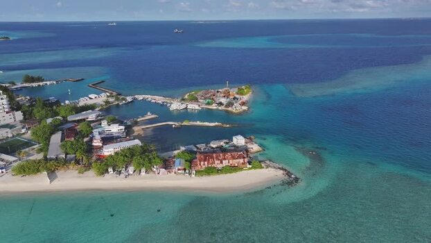 Aerial view of Gulhi island and its turquoise lagoon Maldives. Aerial view of Gulhi island and its turquoise lagoon Maldives.