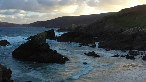Aerial view of rugged cliffs and crashing waves Spain. Aerial view of rugged cliffs and crashing waves Spain.
