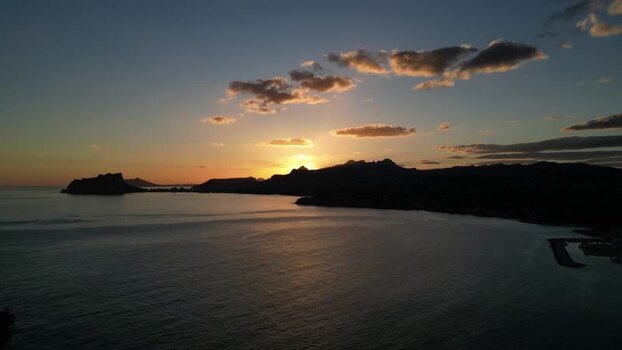 Aerial view of sunset over the coast of Moraira Spain.