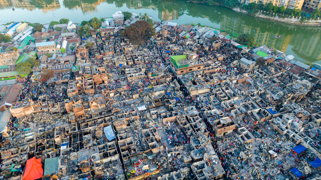 Aerial view of densely packed buildings with a mix of vibrant and muted tones showcasing the urban landscape Dhaka Dhaka Division Bangladesh. Aerial view of densely packed buildings with a mix of vibrant and muted tones showcasing the urban landscape Dhaka Dhaka Division Bangladesh.