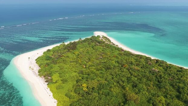 Aerial view of Vaikaramuraidhoo island in the Maldives. Aerial view of Vaikaramuraidhoo island in the Maldives.