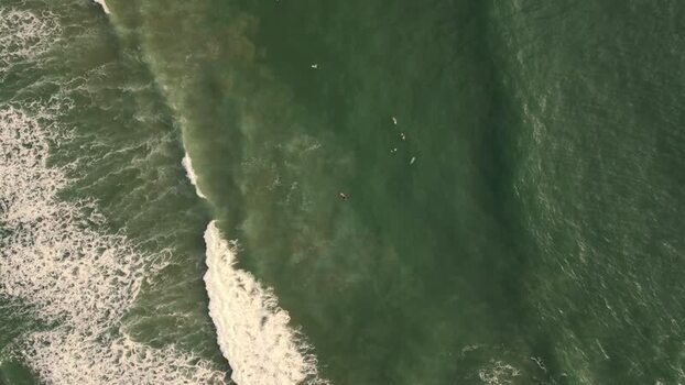 Aerial view of surfers at Praia da Mata Portugal. Aerial view of surfers at Praia da Mata Portugal.