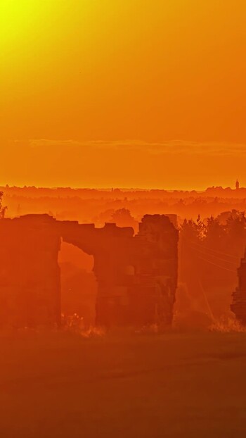 View of ancient stone ruins at sunset in Latvia. View of ancient stone ruins at sunset in Latvia.