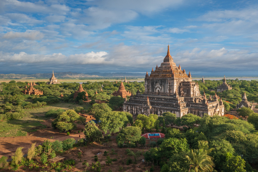 Aerial view of the ancient Sulamani Temple and surrounding pagodas nestled in lush greenery under a cloudy sky in Old Bagan Mandalay Region Myanmar Burma. Aerial view of the ancient Sulamani Temple and surrounding pagodas nestled in lush greenery under a cloudy sky in Old Bagan Mandalay Region Myanmar Burma.