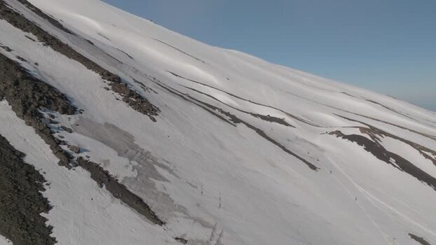 Aerial view of snow covered slopes of Mount Etna near Rifugio Sapienza Italy. Aerial view of snow covered slopes of Mount Etna near Rifugio Sapienza Italy.