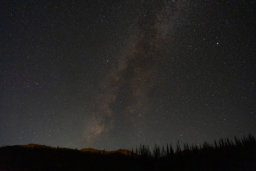 Aerial view of the Milky Way galaxy above the dark silhouette of San Luis Peak and West Willow Creek Trailhead Colorado Trail and Continental Divide Trail Spring Creek Basin Saguache County Colorado