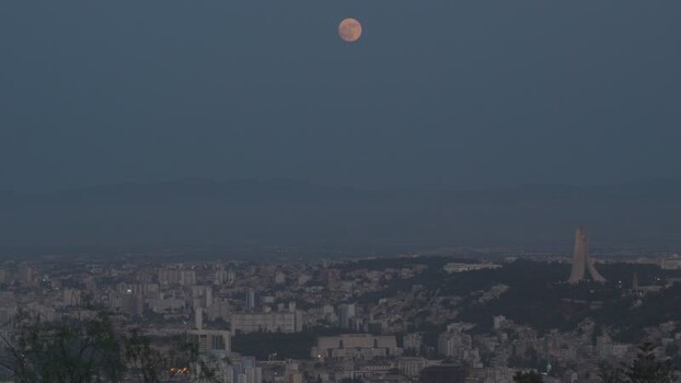 Aerial view of Maqam Echahid and Algiers skyline Algeria.