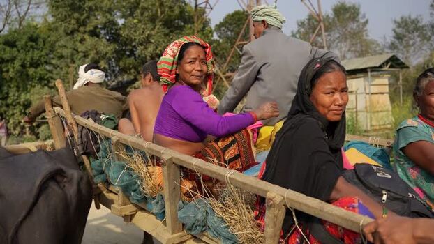 View of people sitting on a wooden cart in Dhangadhi Nepal.