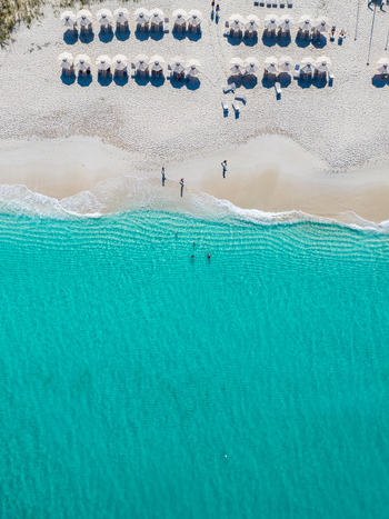 Aerial view of the white sand beach and turquoise water Grace Bay Caicos Islands Turks and Caicos Islands. Aerial view of the white sand beach and turquoise water Grace Bay Caicos Islands Turks and Caicos Islands.